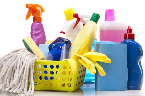 Professional cleaner preparing a Kingston upon Thames home for a thorough clean