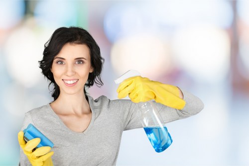 Cleaning staff reviewing hazard controls and using products safely