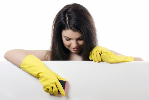 Cleaning staff using protective equipment during a task